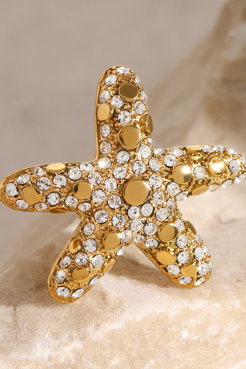 Anillo de diamantes de lujo con forma de estrella de mar