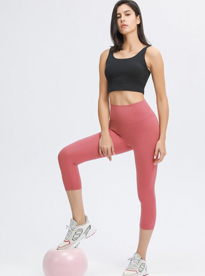 Pantalones de yoga elásticos de cintura alta para hacer ejercicio en color rosa fresa 