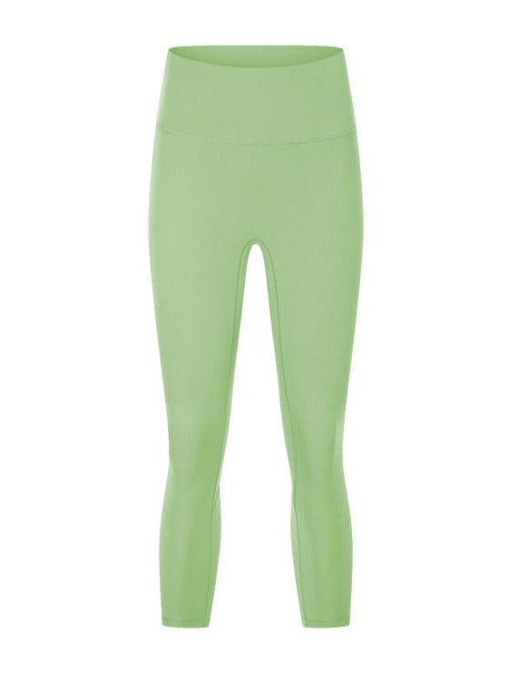 Pantalones de yoga elásticos de cintura alta para hacer ejercicio en color verde manzana