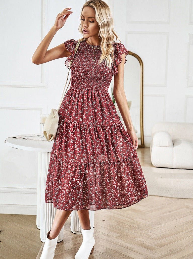 Vestido midi con volantes y cintura definida con diseño floral