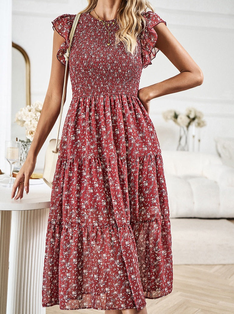 Vestido midi con volantes y cintura definida con diseño floral