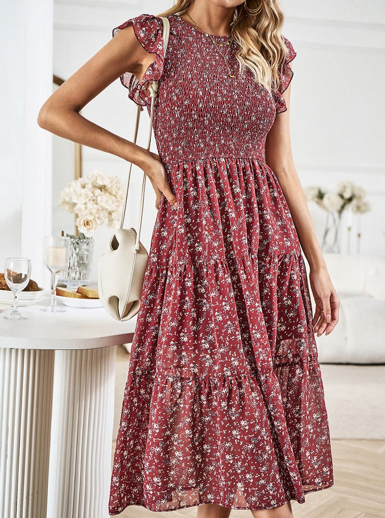 Vestido midi con volantes y cintura definida con diseño floral