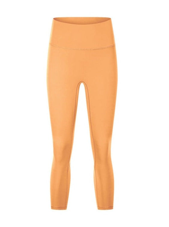 Pantalones de yoga elásticos de cintura alta para ejercicio de color naranja