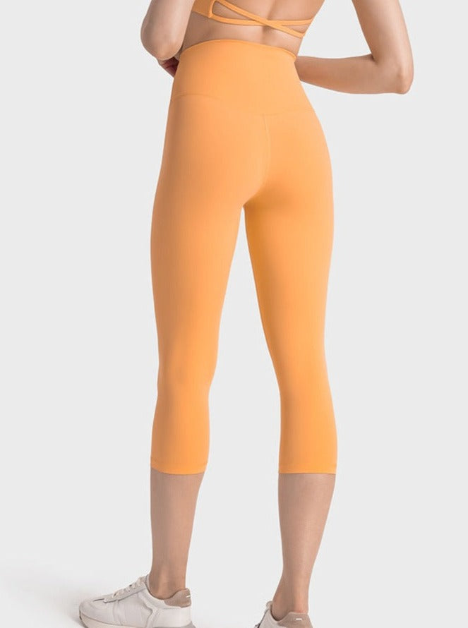 Pantalones de yoga elásticos de cintura alta para ejercicio de color naranja