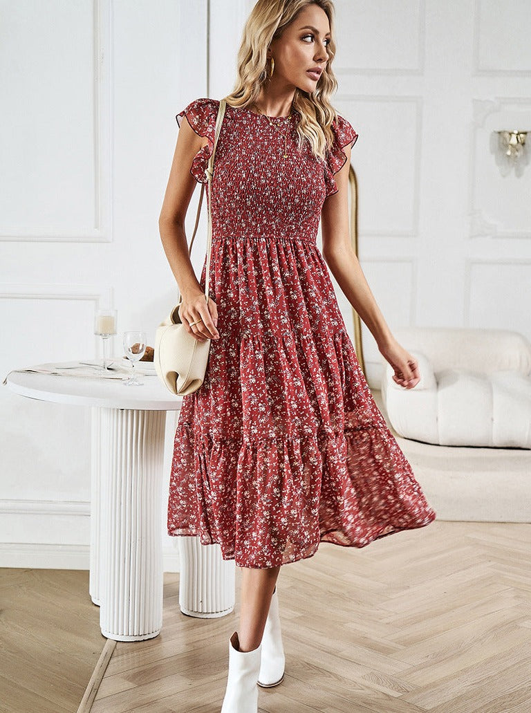 Vestido midi con volantes y cintura definida con diseño floral