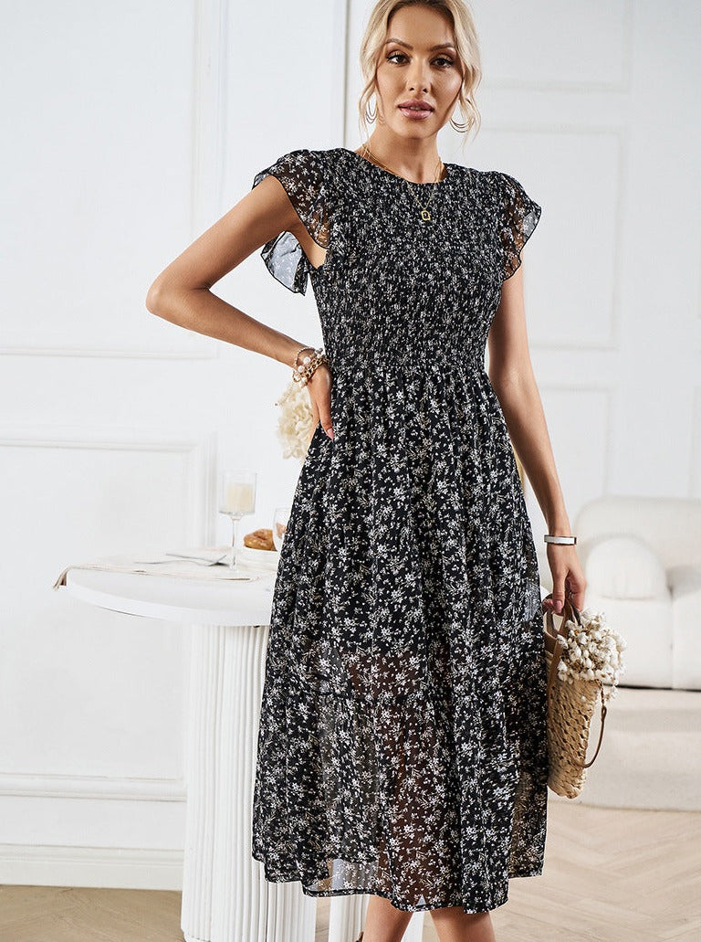 Vestido midi con volantes y cintura definida con diseño floral