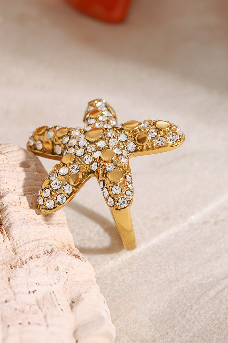 Anillo de diamantes de lujo con forma de estrella de mar